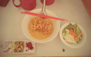 My new favorite Thai dish! CHICKEN KHAO SOI!!!!! It's a Burmese infulenced dish that is very popular and served widely especially in Laos & northern Thailand. It's a bowl of egg noodles and a delicious tender chicken leg covered in a ridicuously good coconut curry, topped with crispy noodles, lime, shallots and pickled cabbage to your taste. It's seriously as awesome as it sounds!!!!!